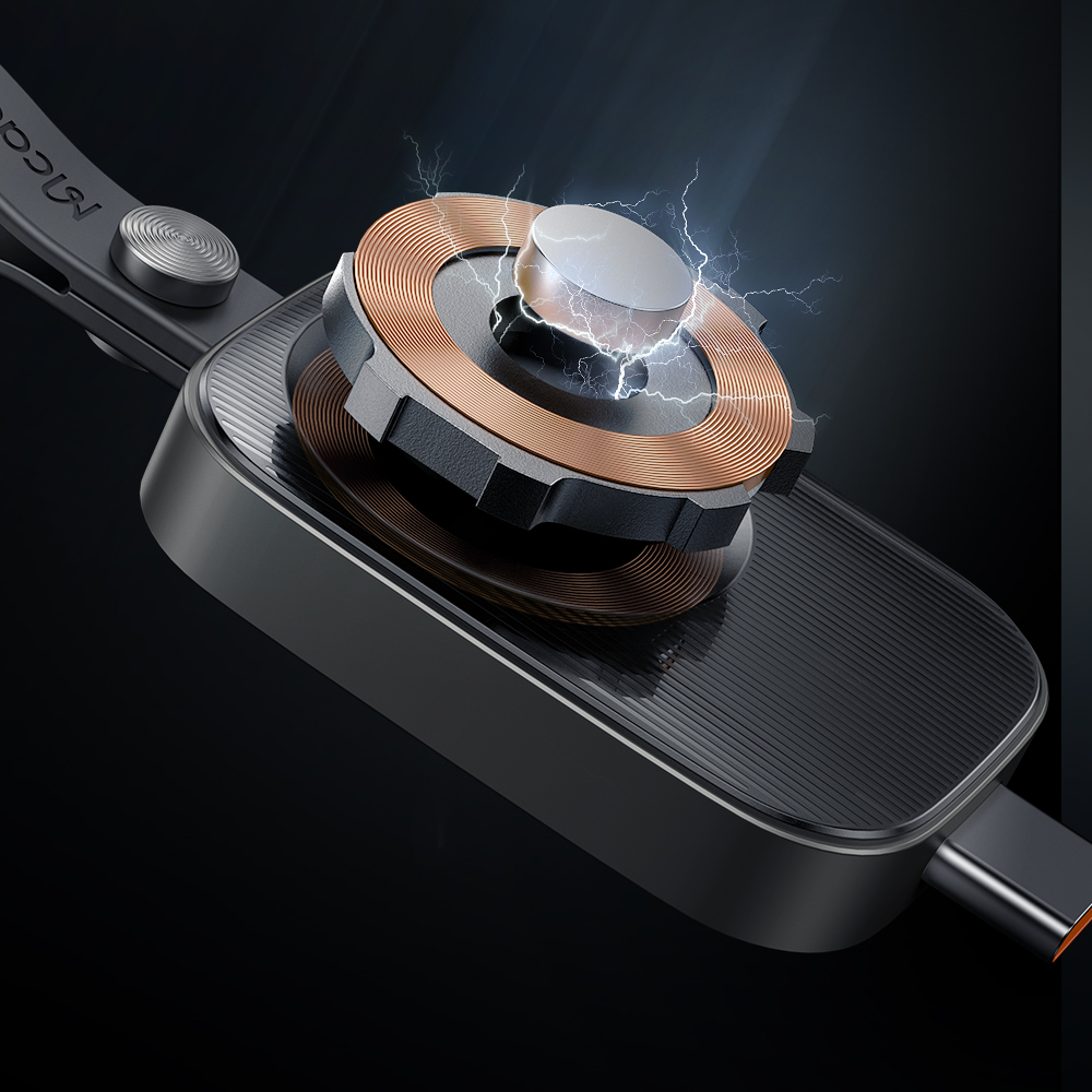 Dispositivo nero con bobine di rame e scintille elettriche su sfondo scuro.