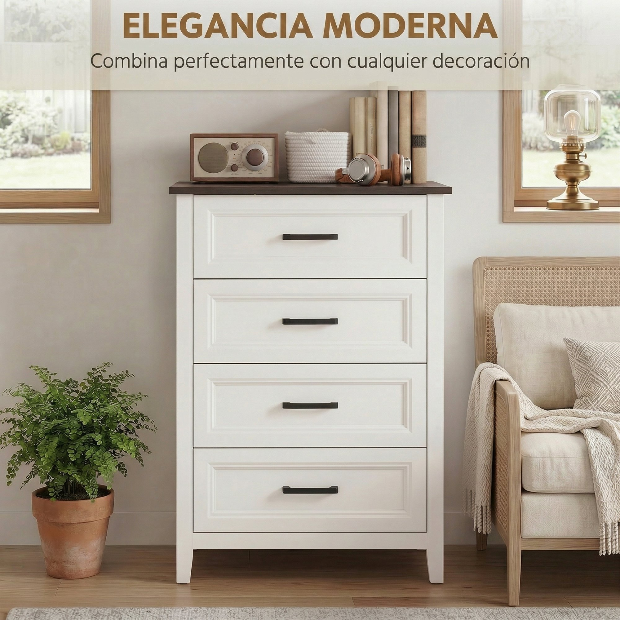Una cómoda blanca de cuatro cajones se encuentra entre una planta en maceta y un sillón en una habitación luminosa.