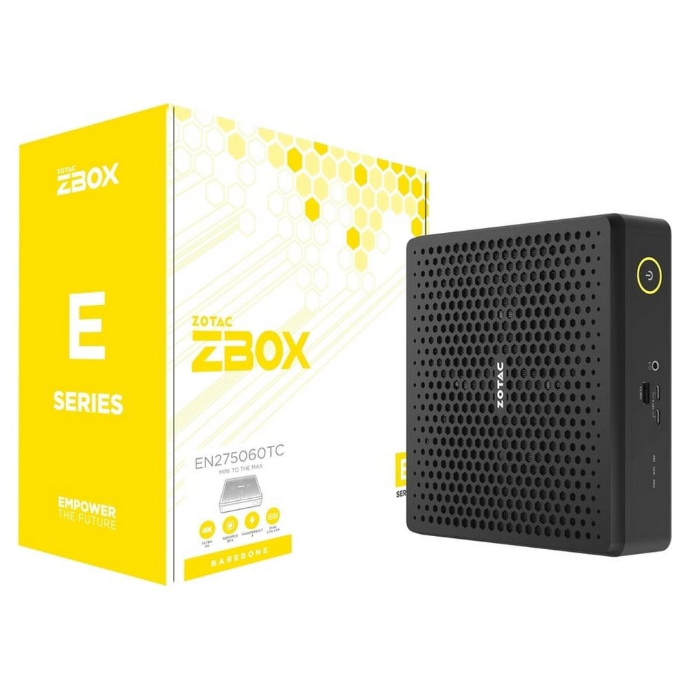 Un mini PC Zotac ZBOX nero si trova accanto alla sua scatola di imballaggio gialla e bianca.