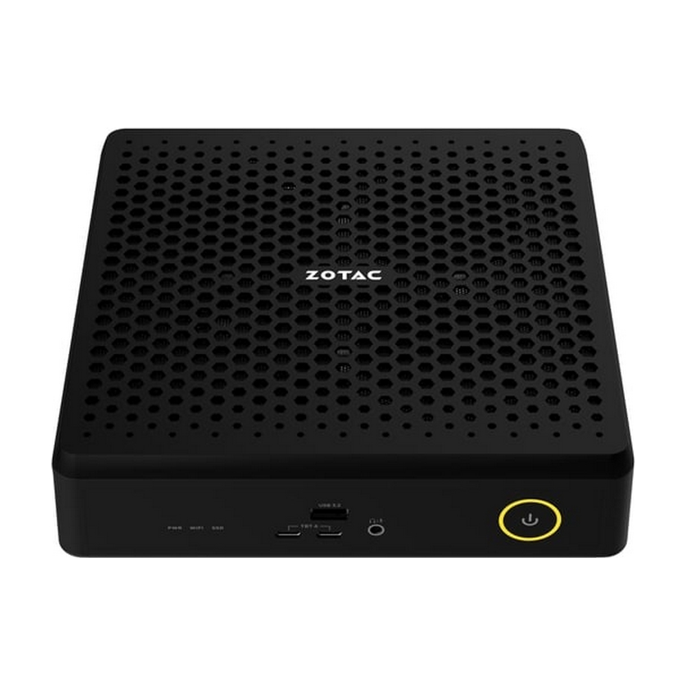 Mini PC Zotac nero con motivo a nido d'ape e pulsante di accensione giallo.