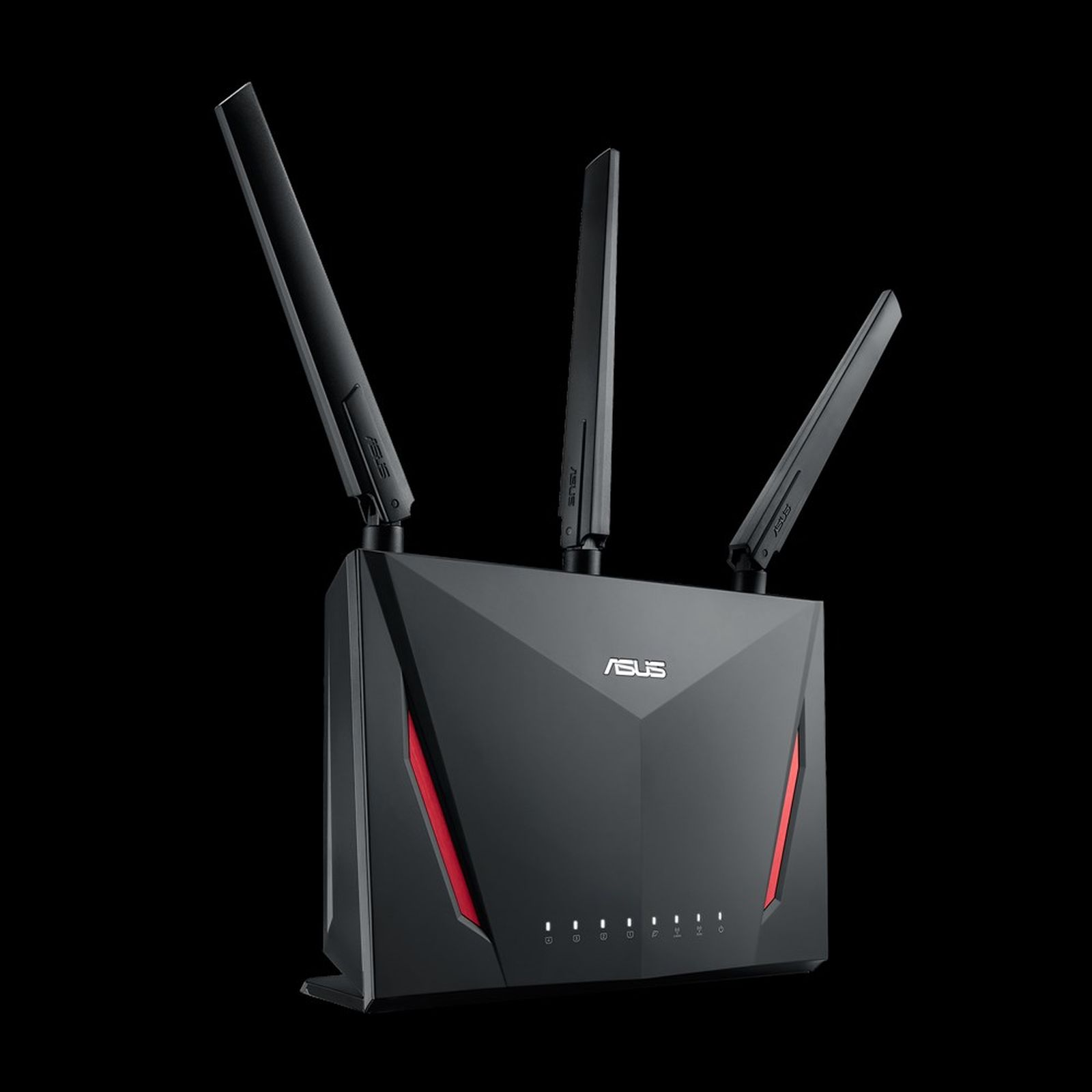 Schwarzer Asus-WLAN-Router mit drei Antennen, roten Akzenten und leuchtenden Kontrollleuchten auf schwarzem Grund.
