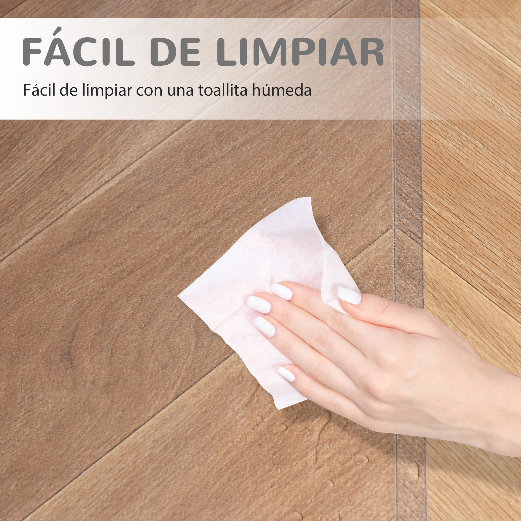 Mano limpiando un suelo de madera con una toallita.