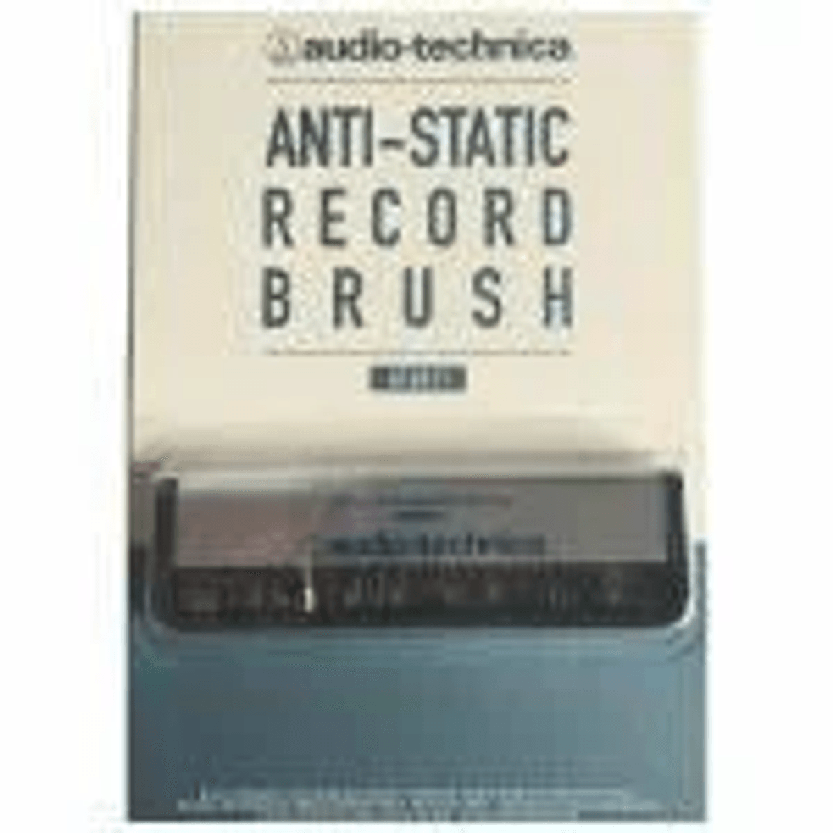 Cepillo antiestático para discos Audio-Technica en su empaque original con diseño gris y blanco.