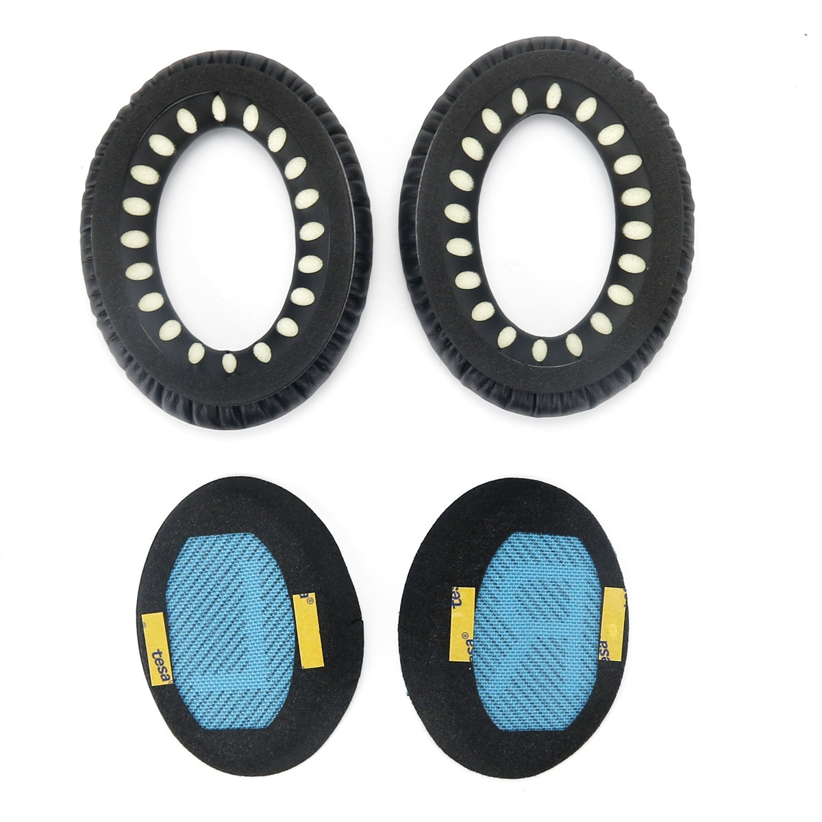 Two black headphone ear pads with blue fabric and adhesive strips on a white background.