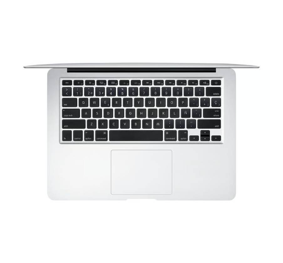 Vista superior de un teclado de portátil plateado con distribución QWERTY en español y trackpad integrado sobre fondo blanco.