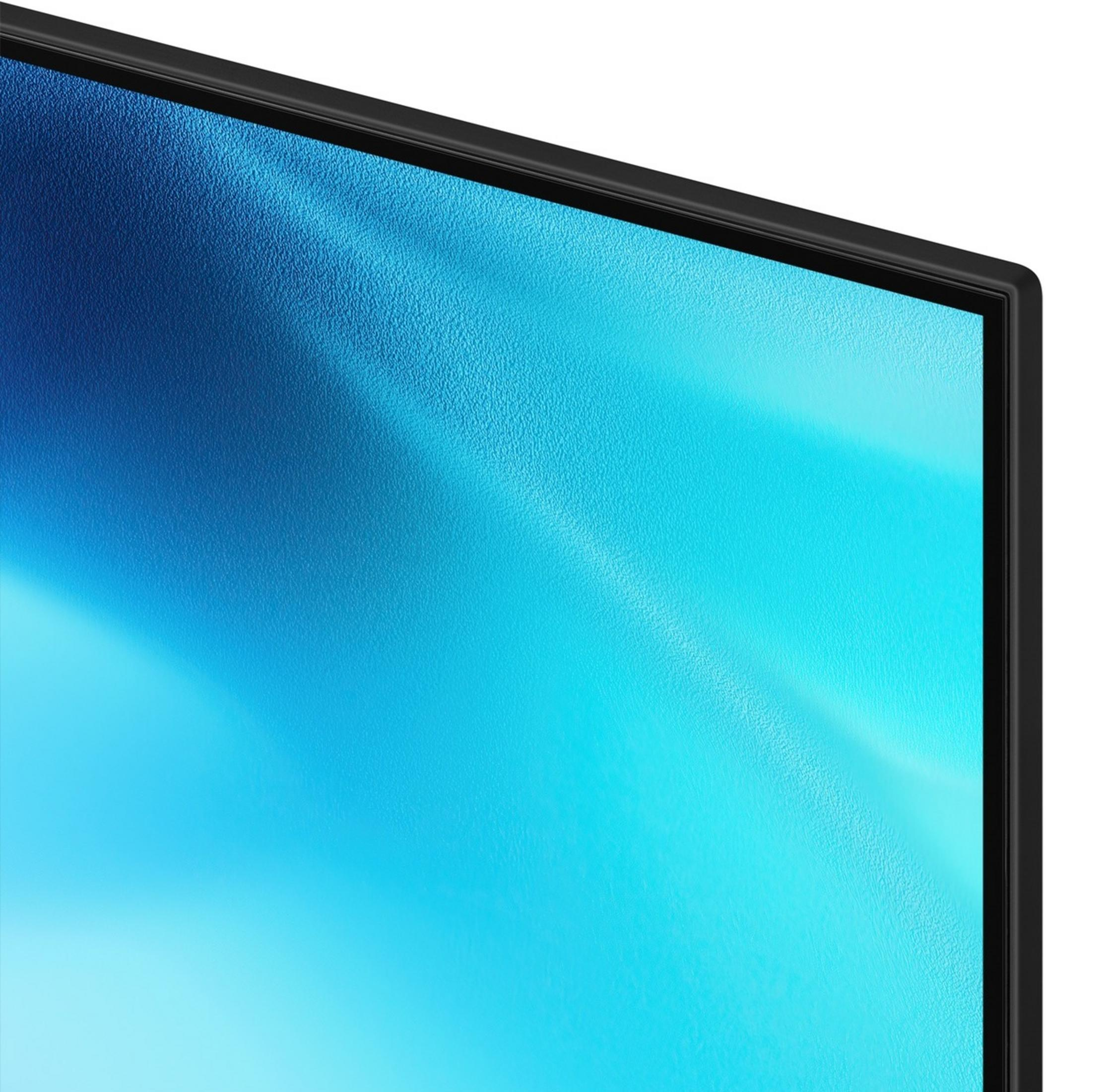 Primo piano dell'angolo di una TV con cornice nera e schermo blu testurizzato.