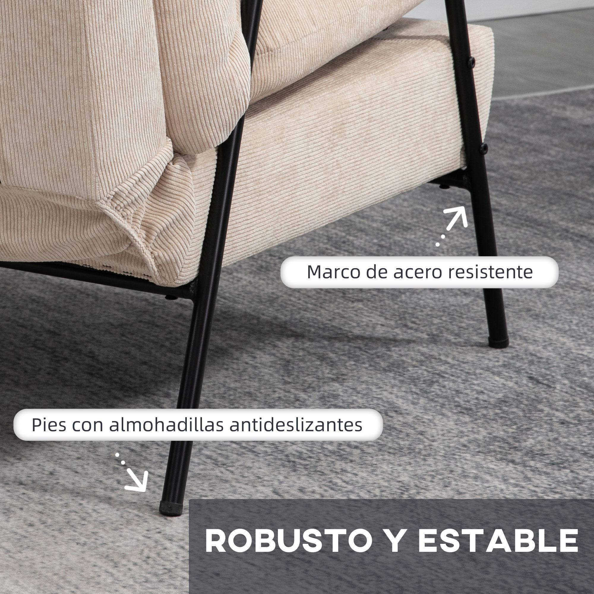 Sillón beige con estructura de acero negro y patas antideslizantes sobre alfombra gris.