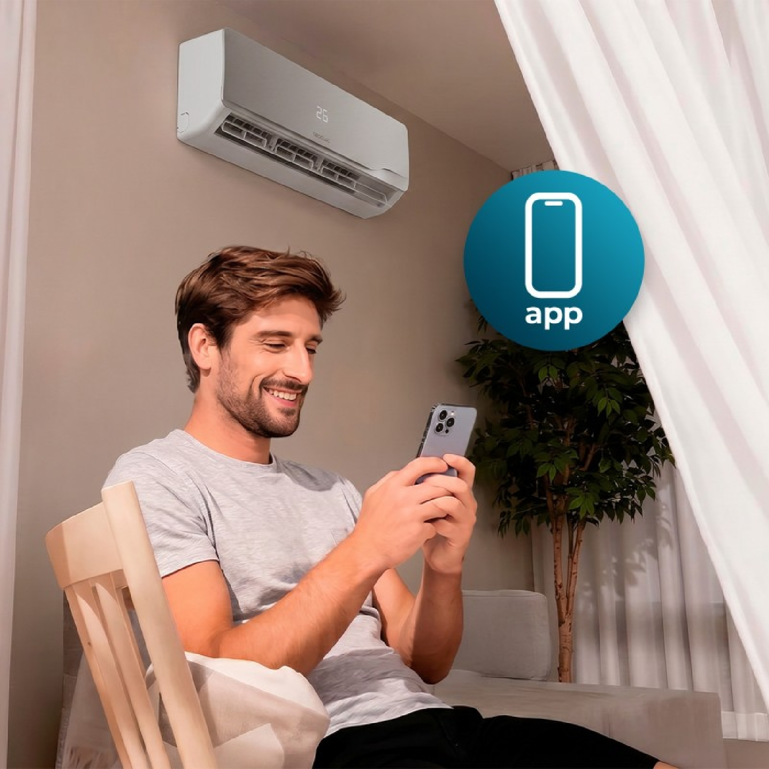 Hombre sentado en una silla usando una aplicación móvil para controlar el aire acondicionado en una sala.