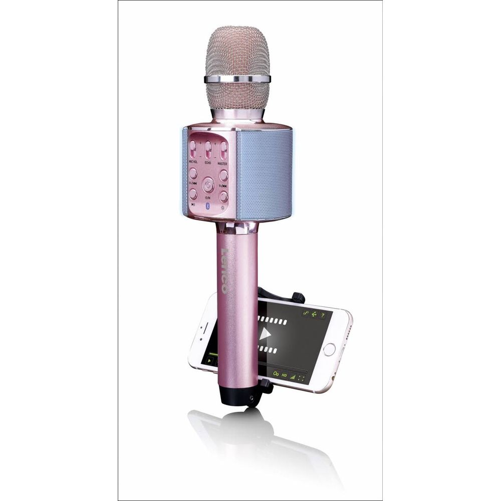 A pink wireless karaoke microphone with built-in speaker and a smartphone attached to its handle.