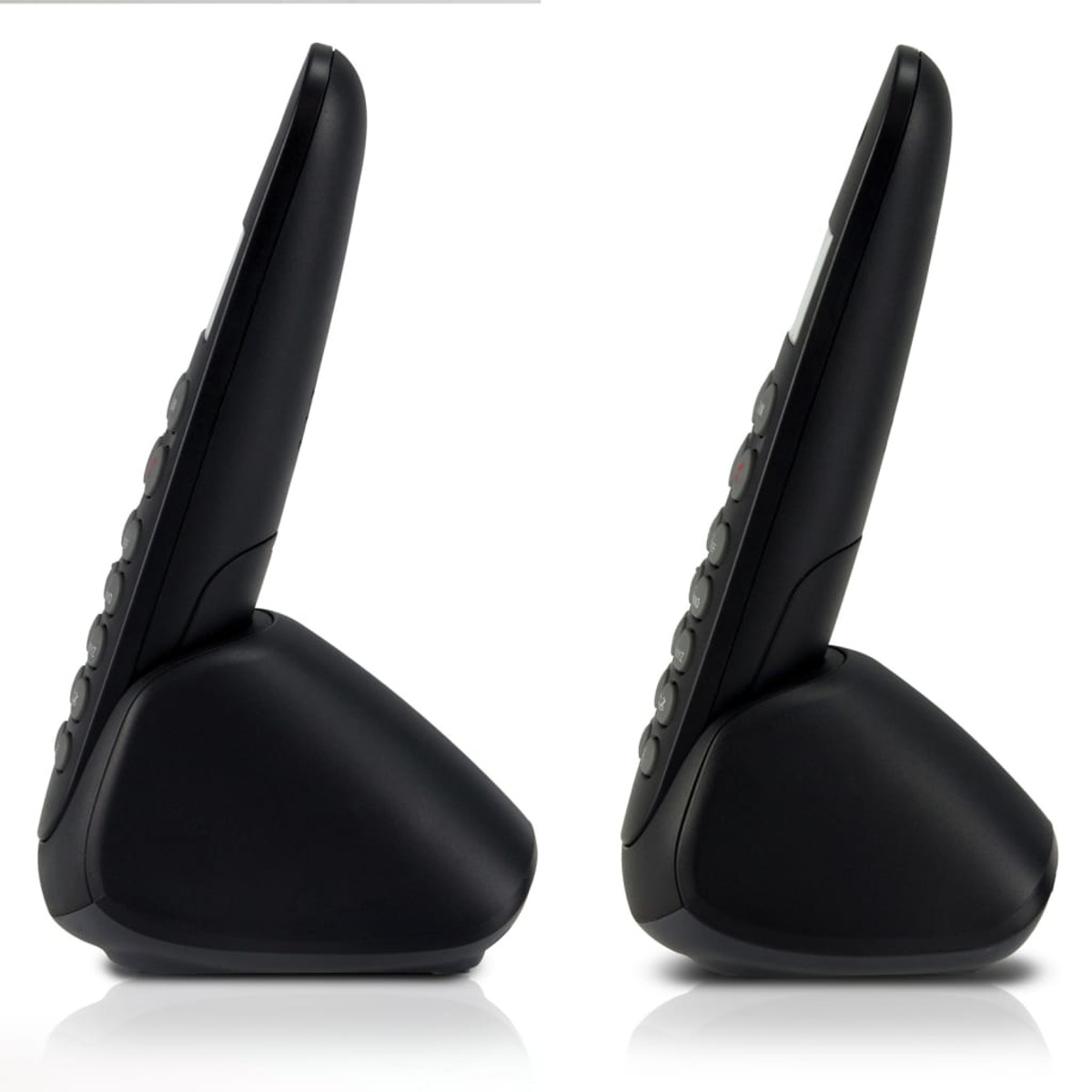 Two black cordless phones stand in their charging bases against a white background.