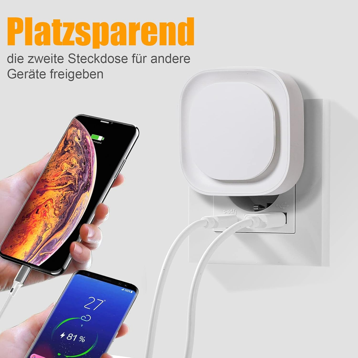 Ein weißer Steckdosenadapter steckt in der Wand und lädt zwei Smartphones mit USB-Kabeln.