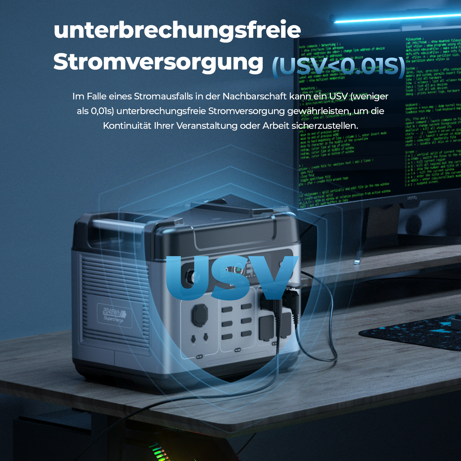 Eine Powerstation mit USV-Funktion steht auf einem Holztisch vor einem Monitor.