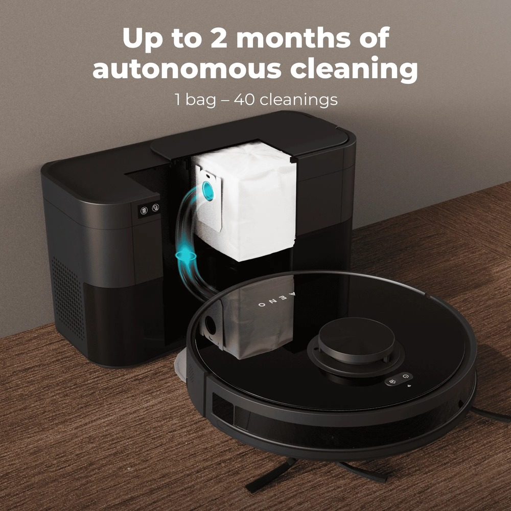 Czarny odkurzacz automatyczny dokuje do stacji bazowej z widocznym białym workiem na kurz.