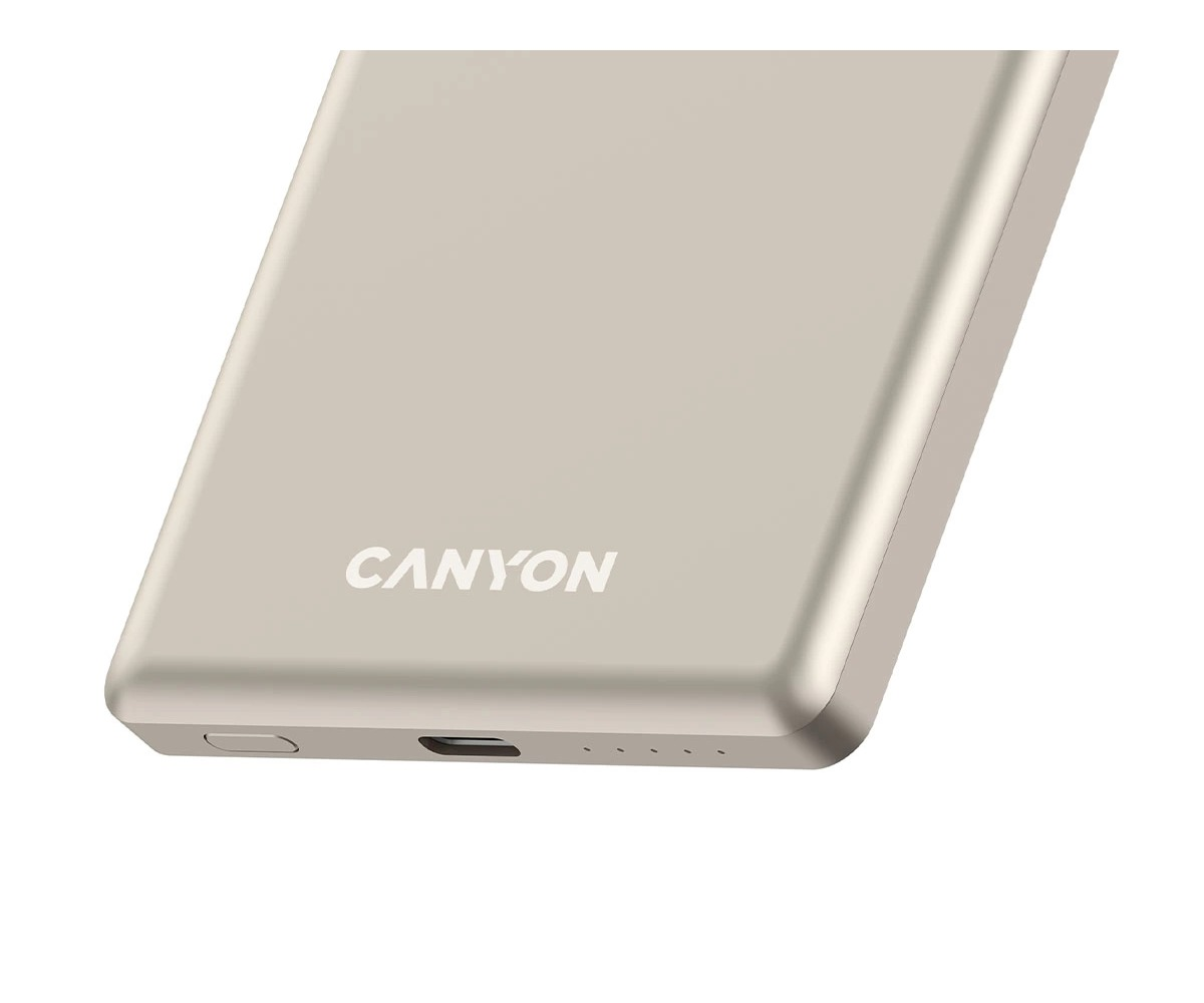 Złoty powerbank Canyon z portem i logo na białym tle.
