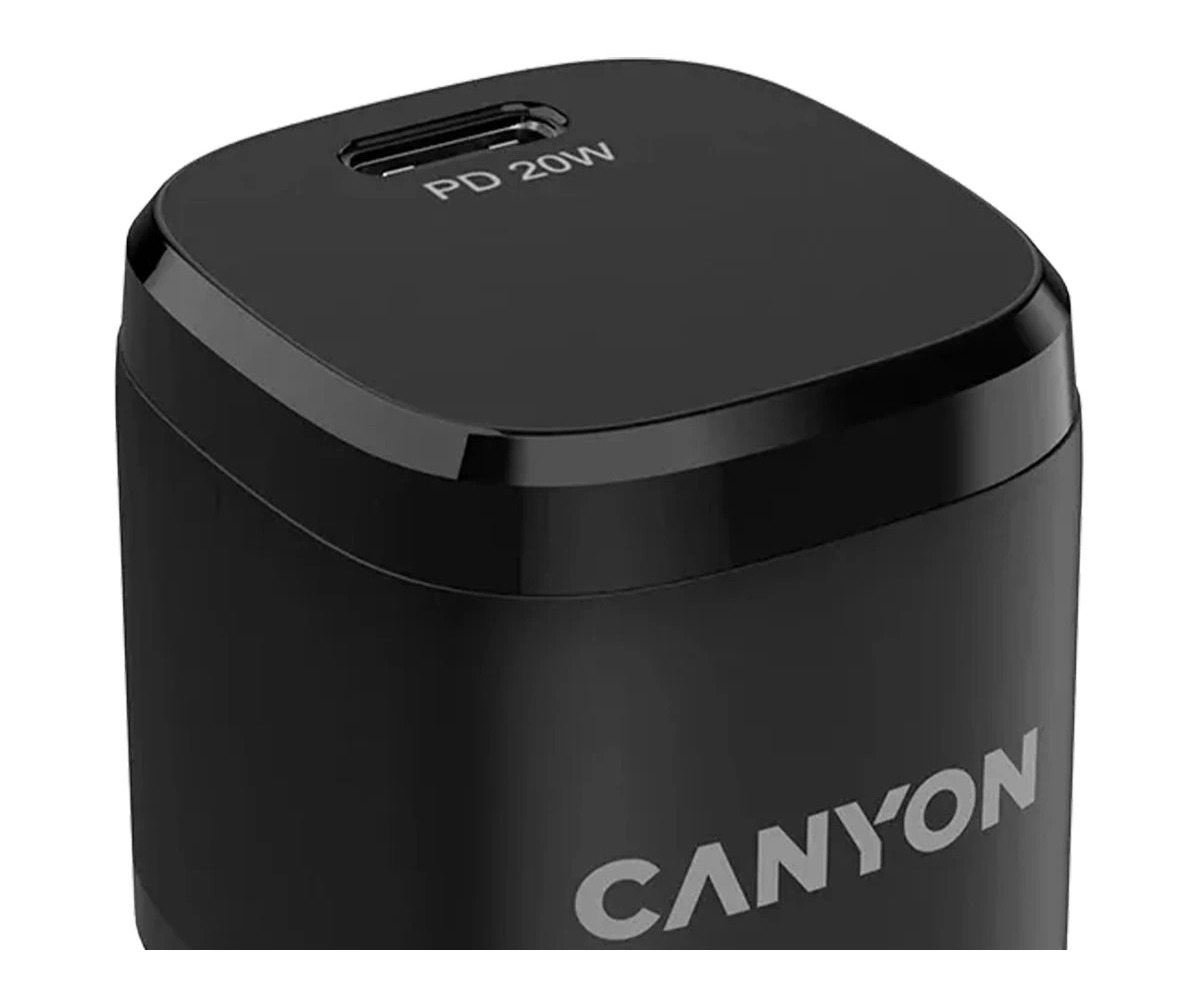Czarna szybka ładowarka USB-C Canyon PD 20W z białym logo i tekstem na białym tle.