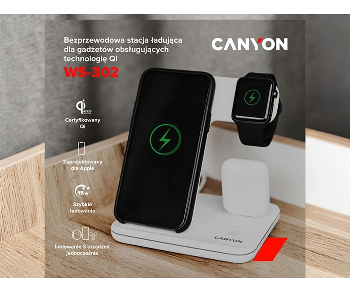 Biała bezprzewodowa stacja ładująca Canyon z telefonem, zegarkiem i słuchawkami.