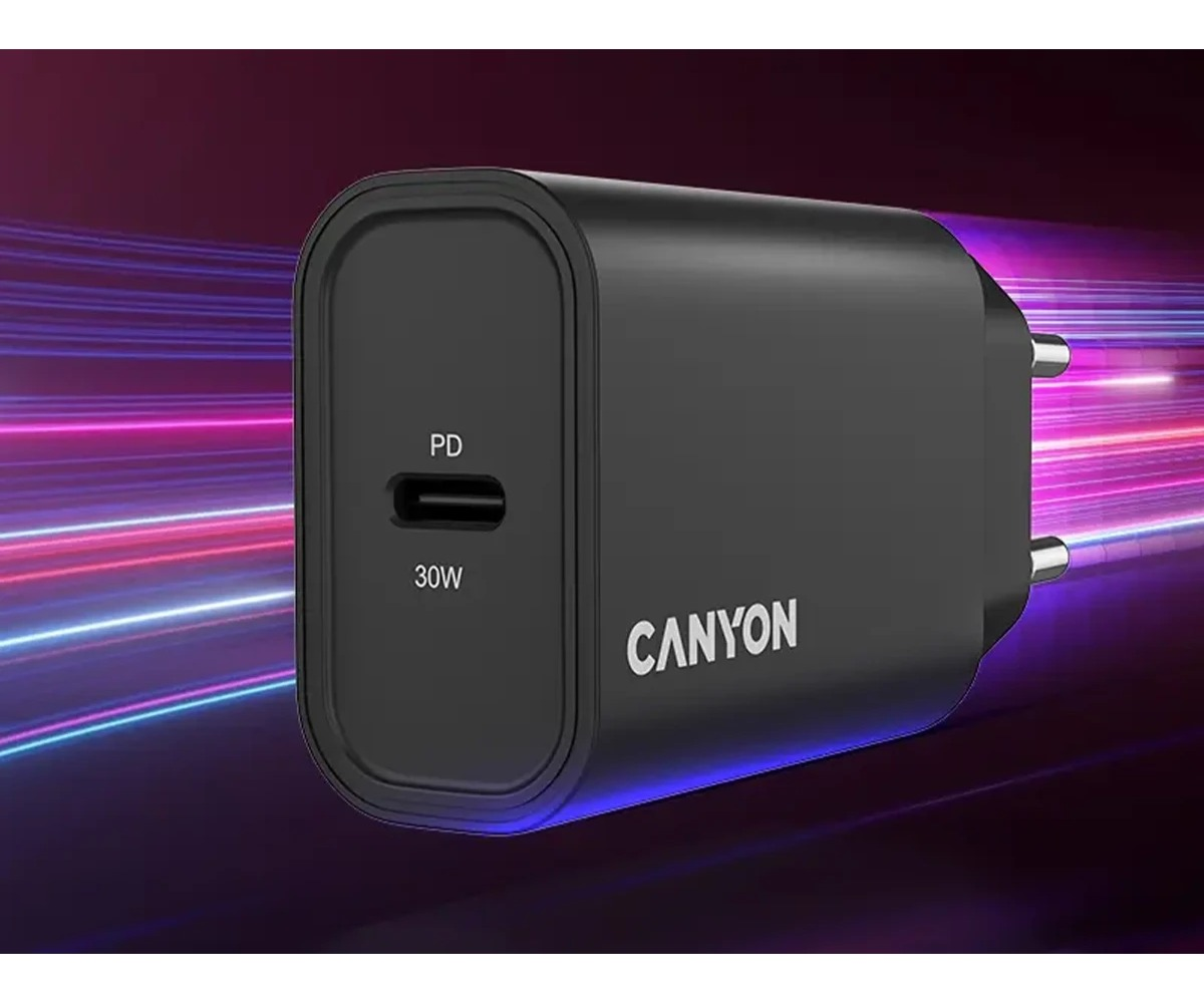 Czarne ładowarka USB-C Canyon 30W z bolcami na tle neonowego światła.