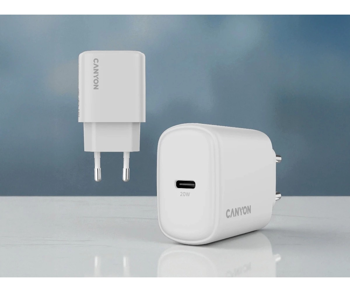 Dwa białe ładowarki ścienne USB-C Canyon 20W na białej powierzchni na niebieskim tle.