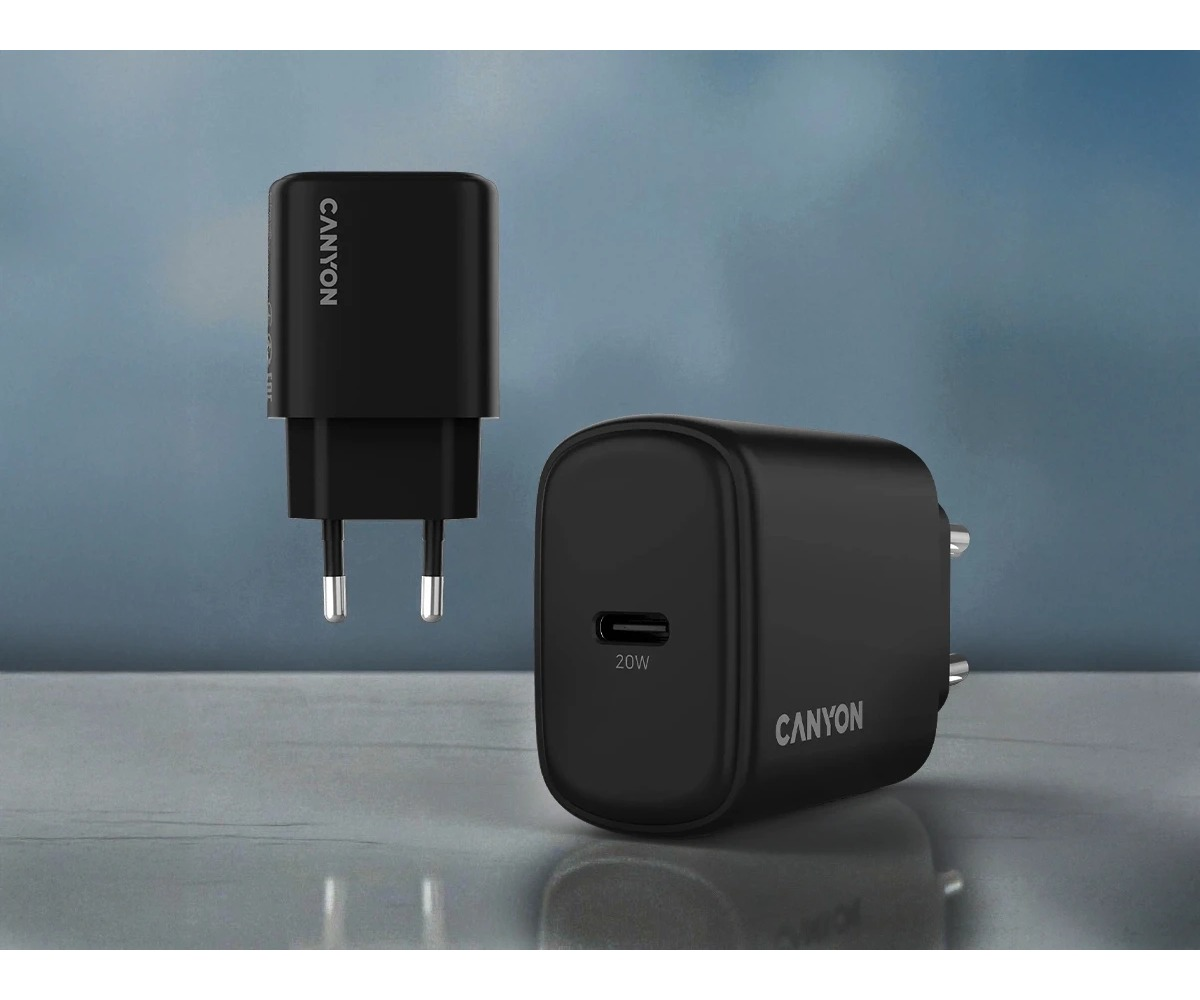 Dwa czarne ładowarki ścienne Canyon 20W USB-C na szarym tle z niebieskim tłem.