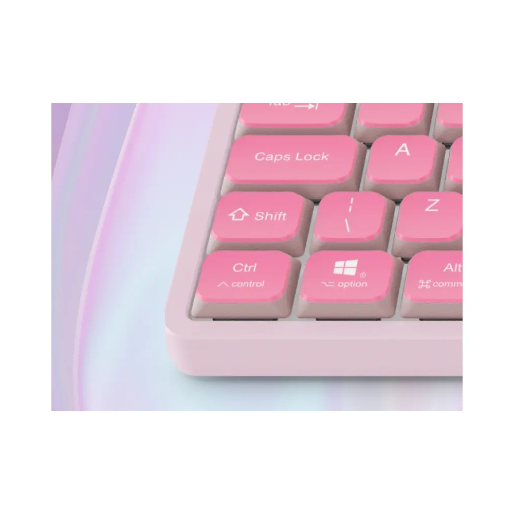Zbliżenie różowej klawiatury z klawiszami Caps Lock, Shift i Ctrl na różowym tle.