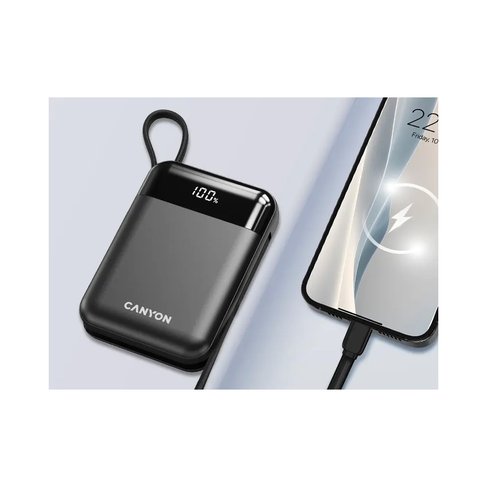 Czarny powerbank Canyon z cyfrowym wyświetlaczem 100% ładujący smartfon na jasnym tle.