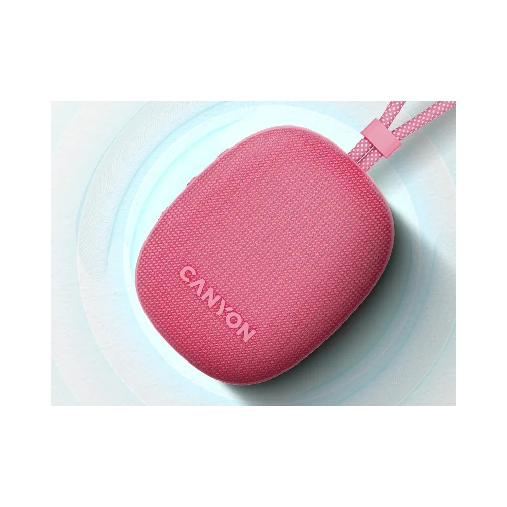 Różowy głośnik Bluetooth CANYON z paskiem na tle jasnoniebieskich fal.