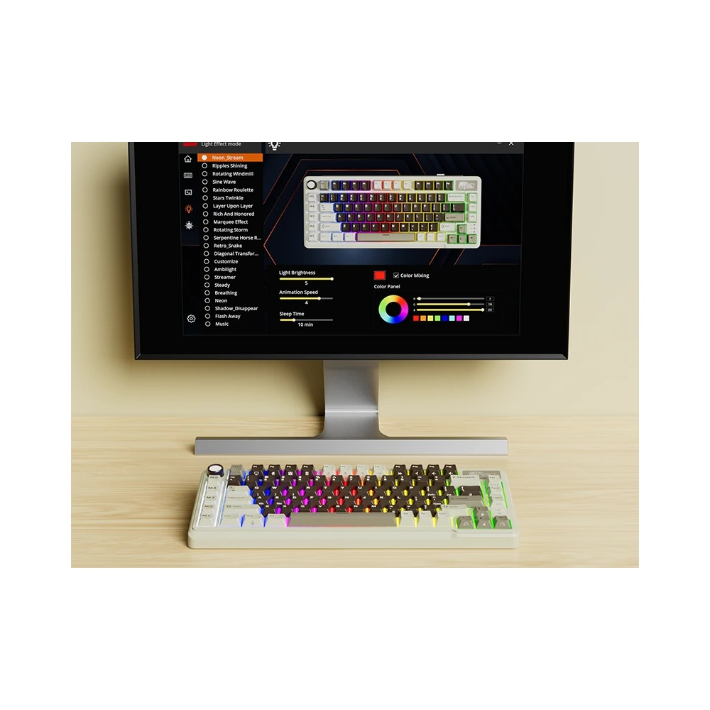 Klawiatura mechaniczna przed monitorem z oprogramowaniem do sterowania RGB.