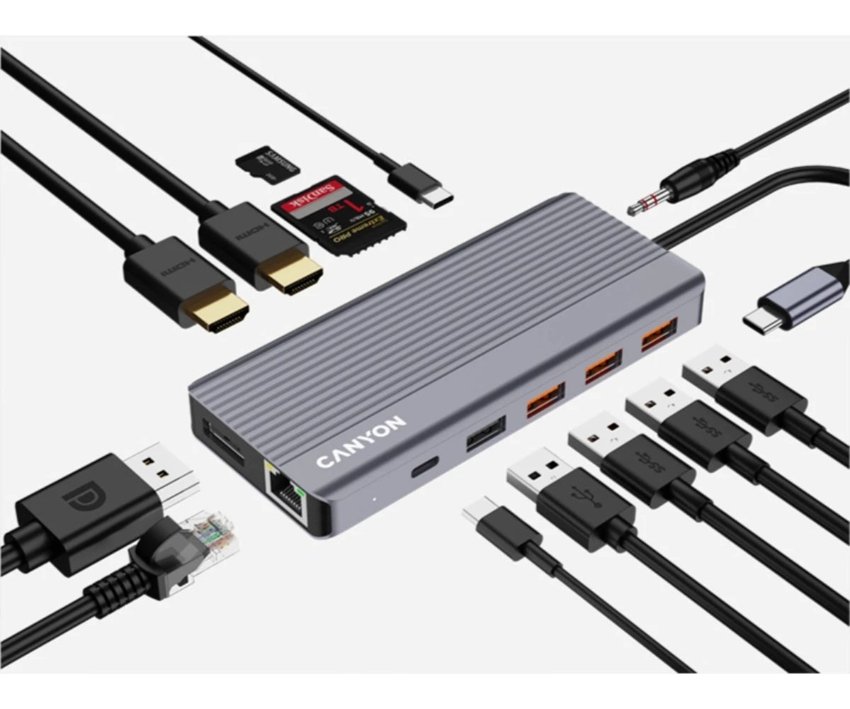 Szary hub USB-C Canyon z różnymi podłączonymi kablami i kartami pamięci.