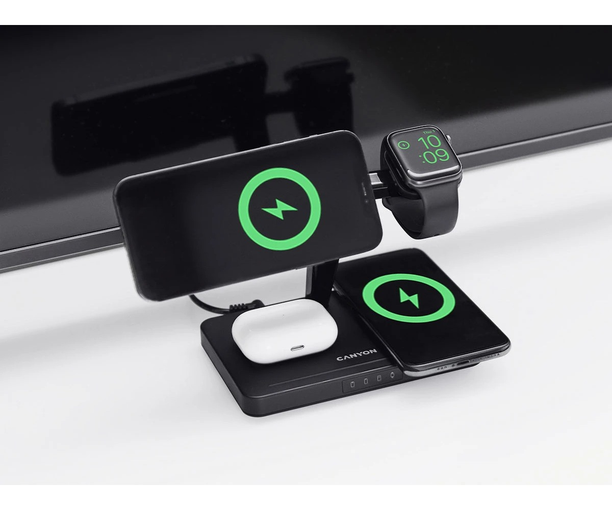Czarna bezprzewodowa stacja ładująca 3 w 1trzyma smartfon, smartwatch i słuchawki.