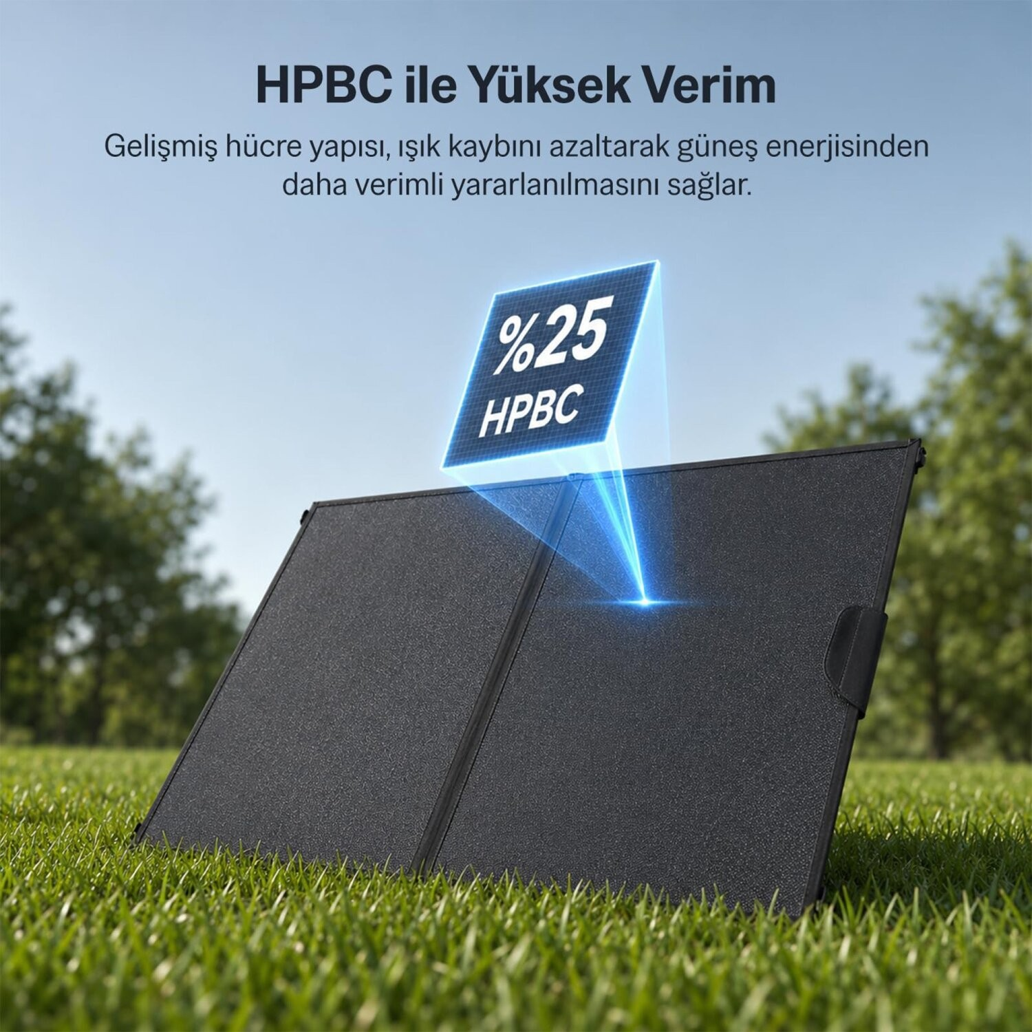 Çimenlik alanda yüzde 25 HPBC verimlilik grafiği gösteren taşınabilir bir güneş paneli.