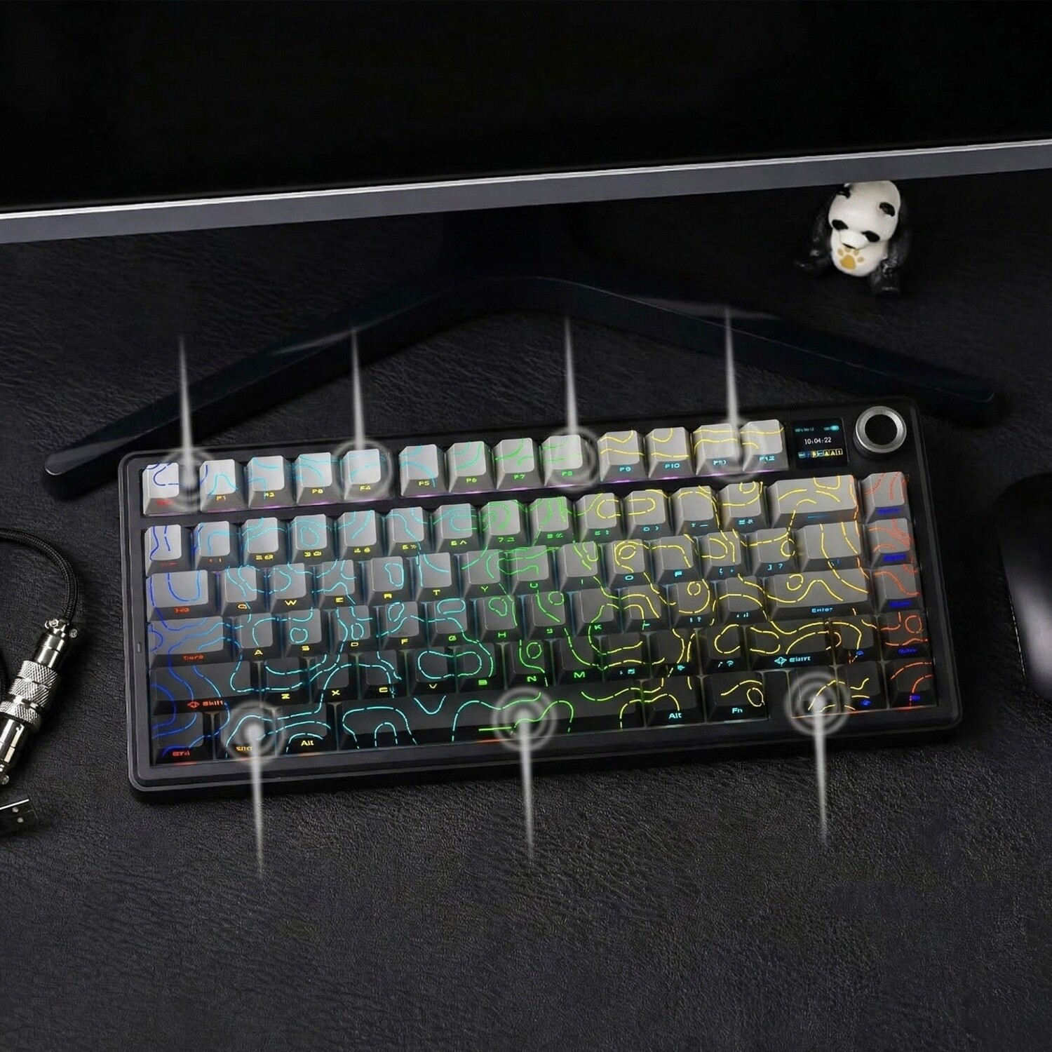 Mechaniczna klawiatura gamingowa z wzorem topograficznym, podświetleniem RGB i małym wyświetlaczem.