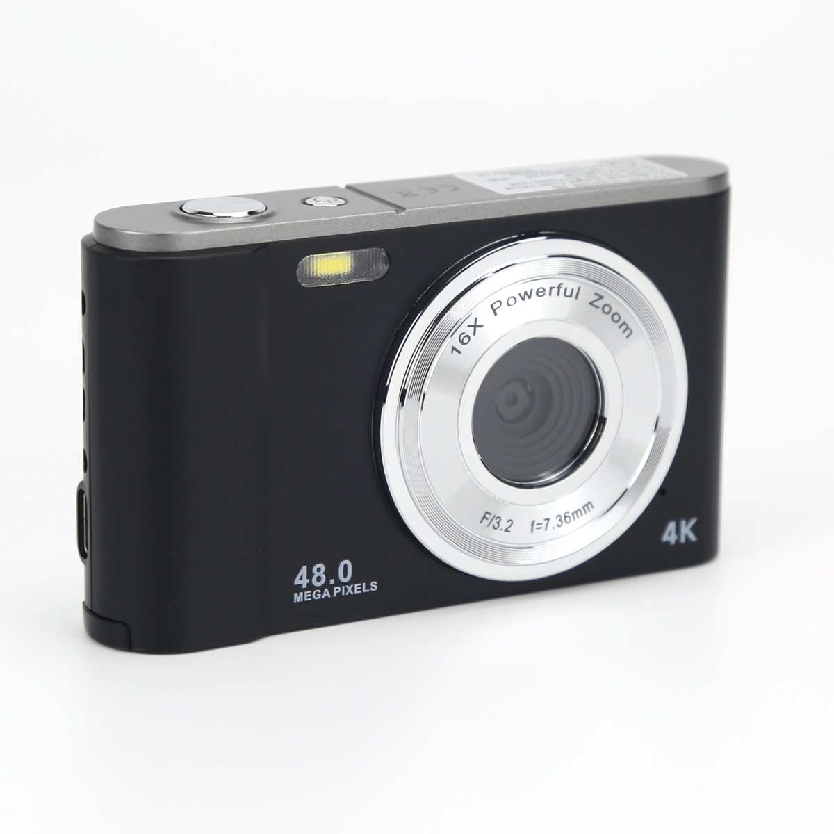 Black digital camera with a silver zoom lens and 4K label on a white background.