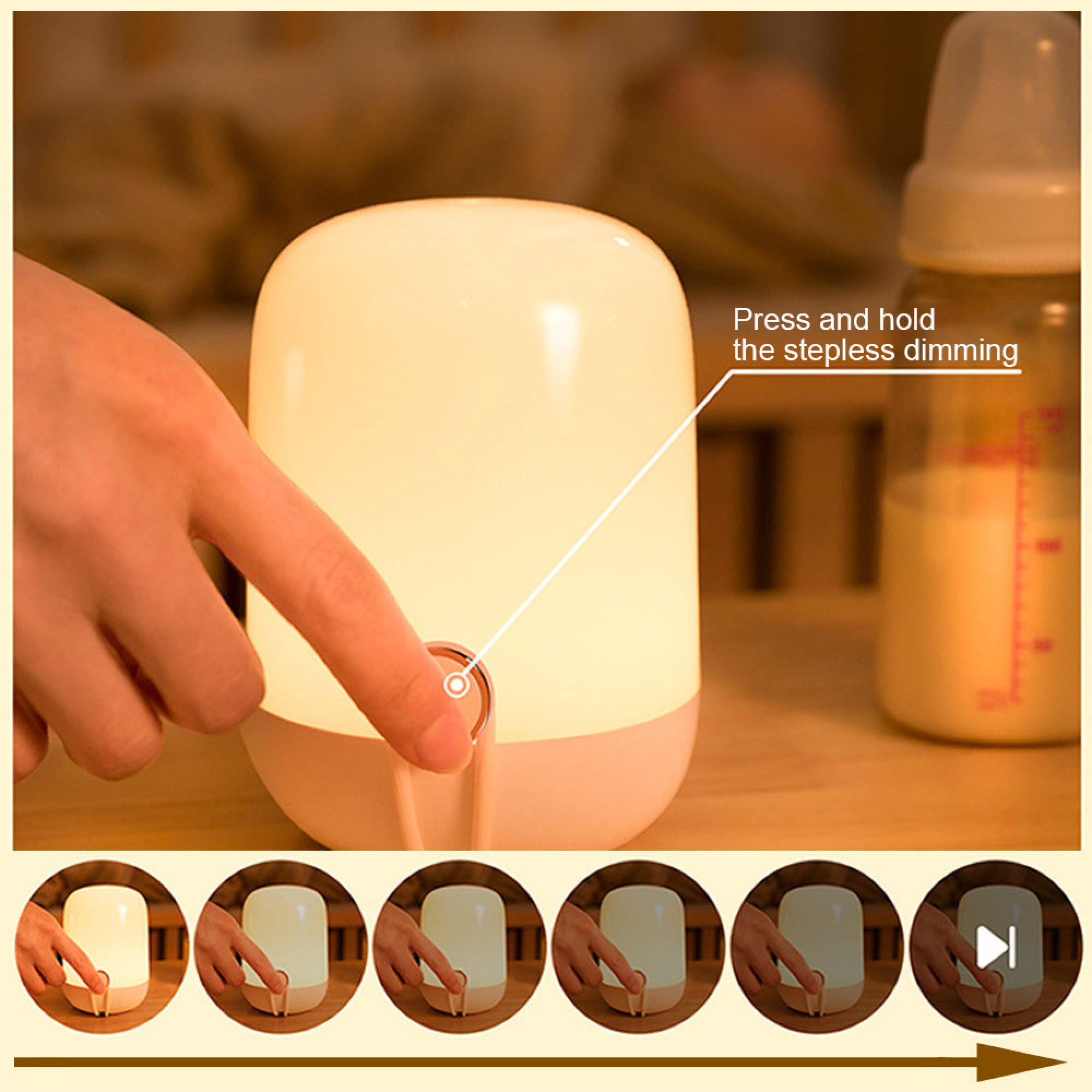 Hand berührt eine weiße, leuchtende Nachttischlampe, daneben steht eine Babynasche auf einem Tisch.