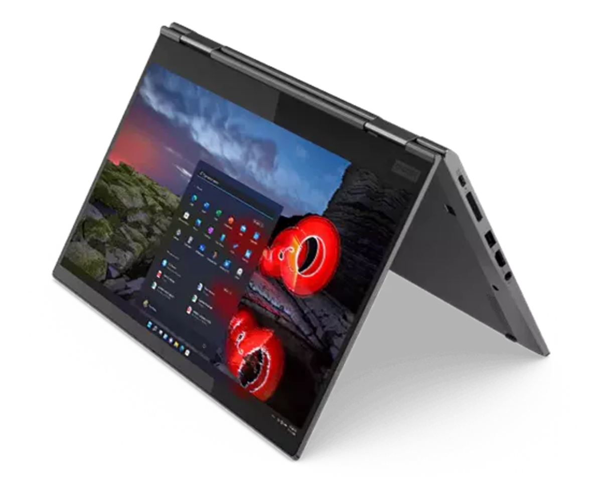 Ein grauer Laptop im Zeltmodus auf schwarzem Hintergrund mit Windows-Startmenü.