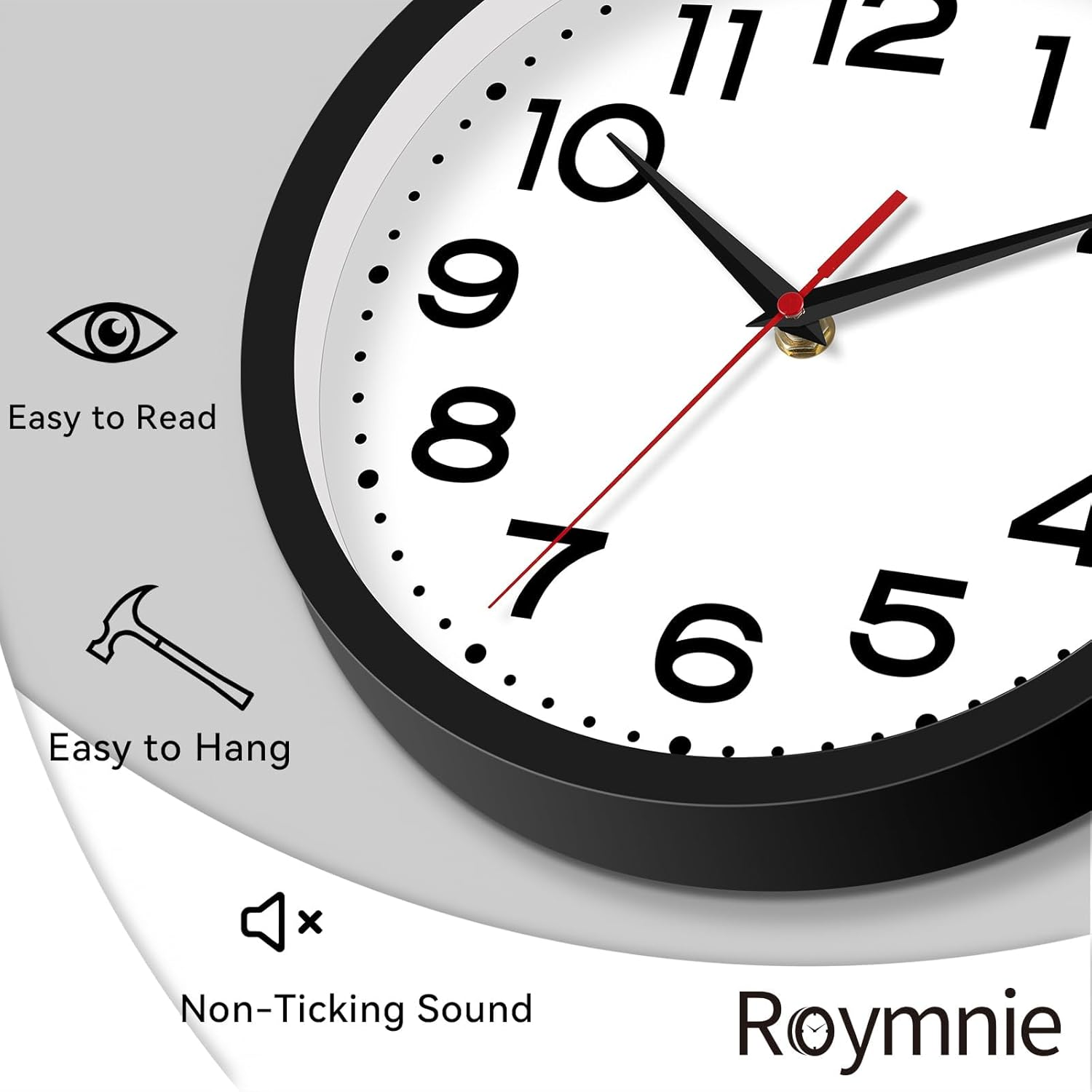 Nahaufnahme einer runden Wanduhr mit schwarzem Rand und Symbolen für leicht ablesbar, aufhängbar und lautlos.
