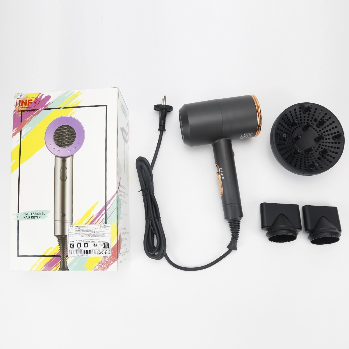A grey hair dryer with attachments and its original box on a white background.