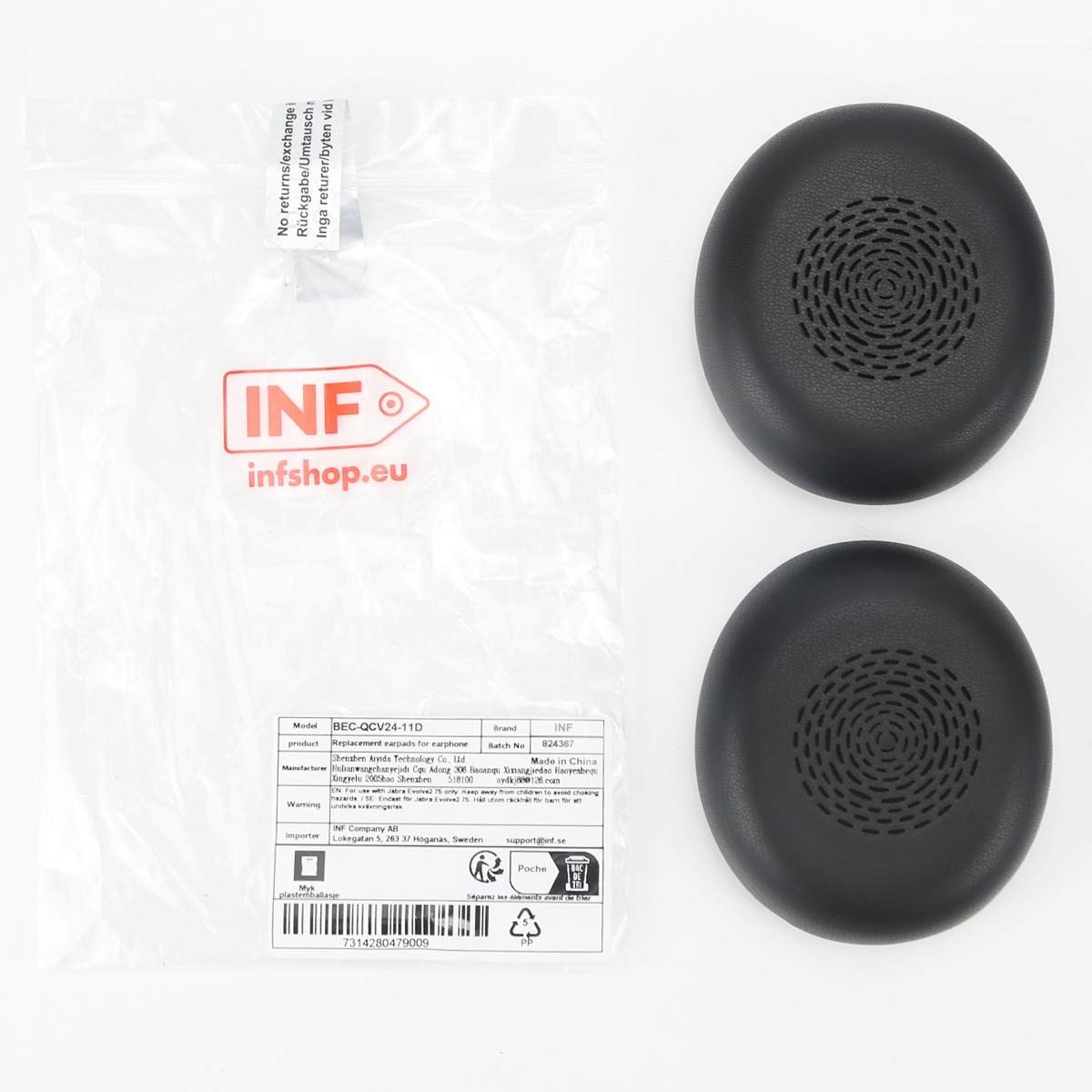 Two black headphone earpads next to a plastic bag with a product label.