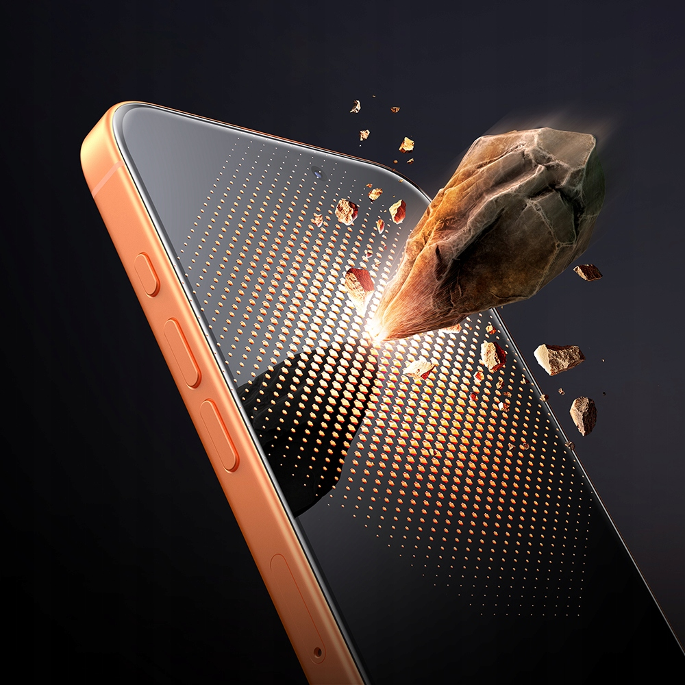 Una roccia colpisce e frantuma lo schermo di uno smartphone arancione.