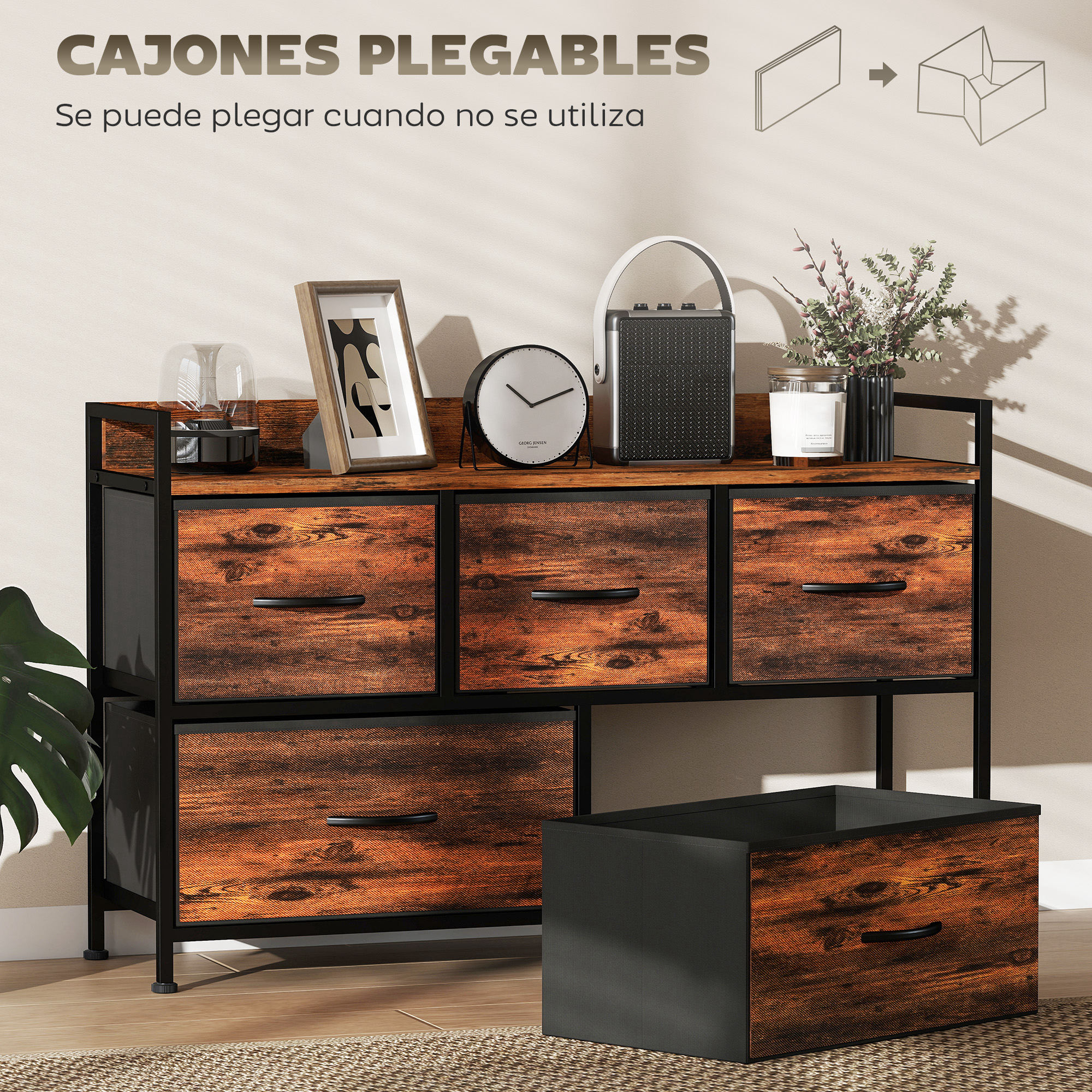 Cómoda rústica de madera con estructura de metal negro y cajones plegables, decorada con reloj, altavoz y plantas.
