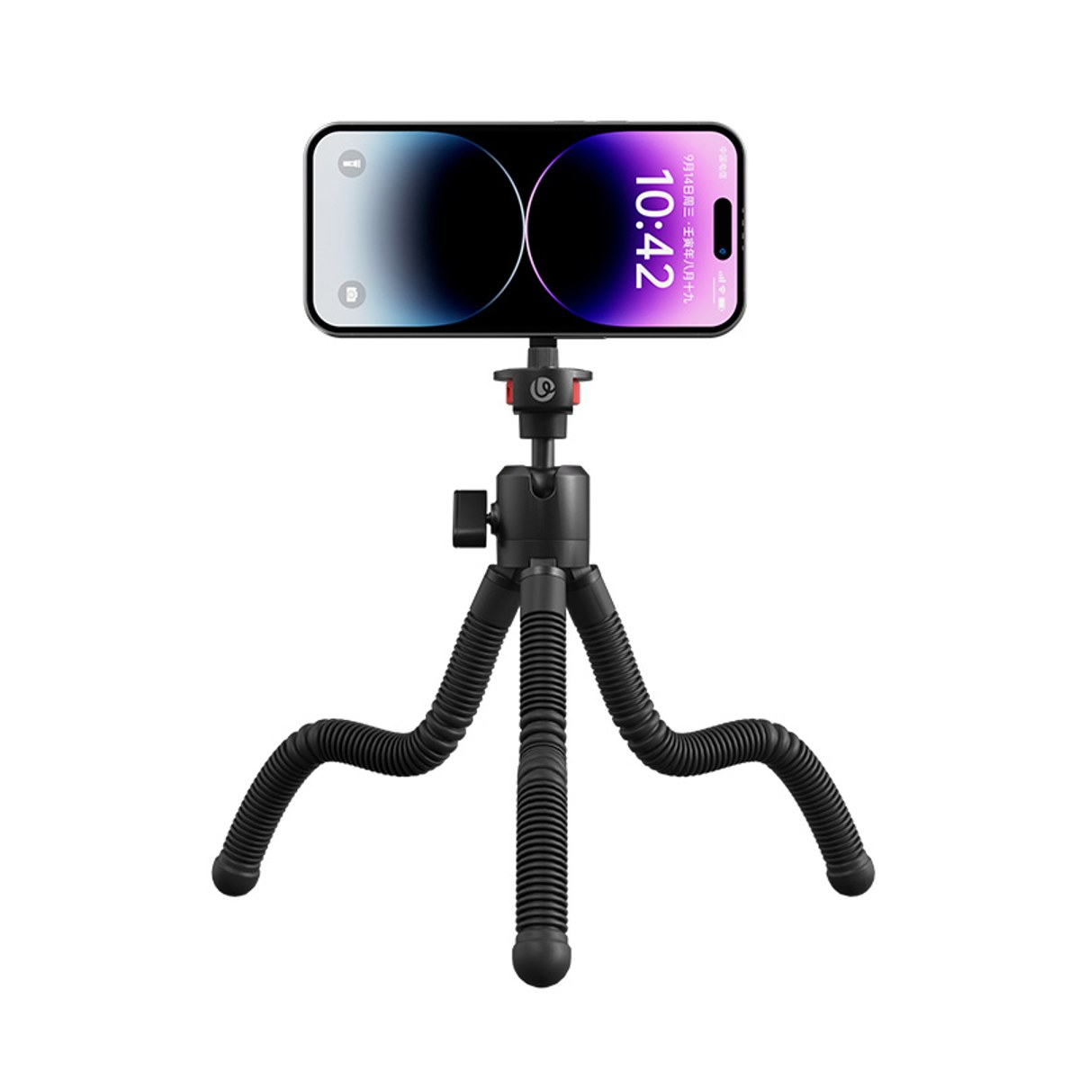 Czarny mini statyw z elastycznymi nogami trzyma smartfon z podświetlanym ekranem na białym tle.