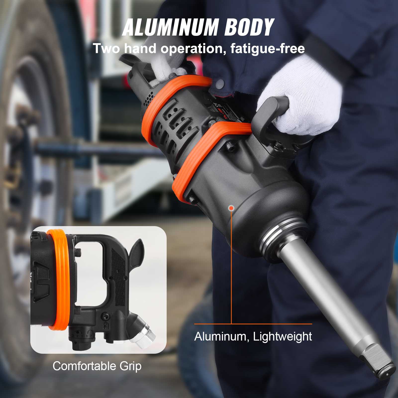 Un trabajador sostiene una llave de impacto grande con cuerpo de aluminio.