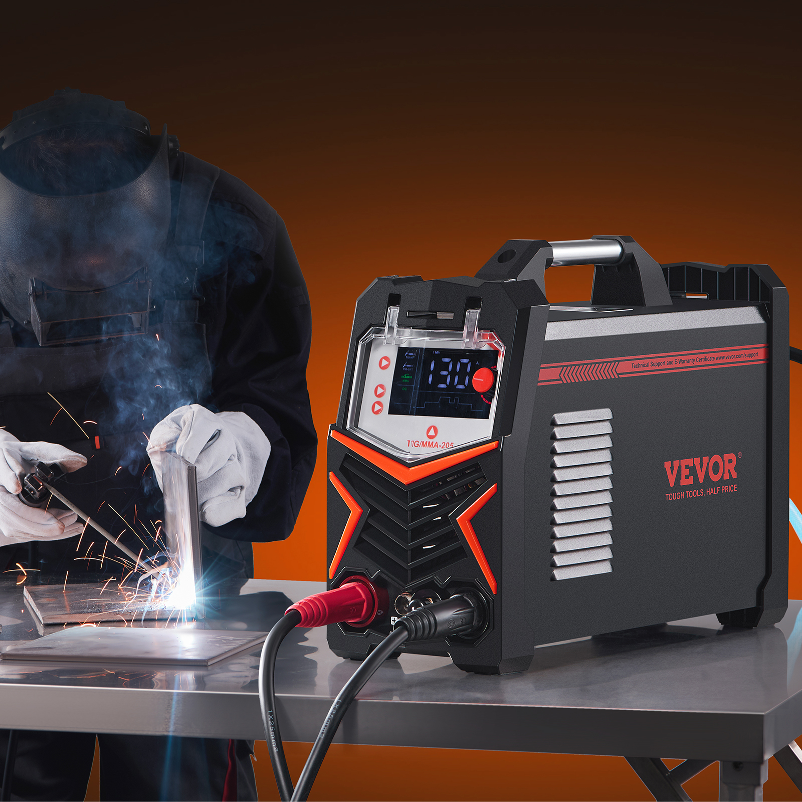 Un soldador con equipo de protección trabaja con una máquina de soldar Vevor en una mesa con chispas.