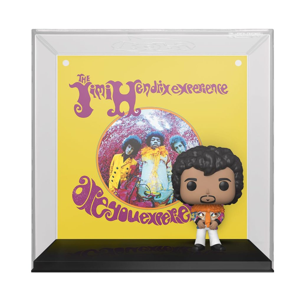 Jimi Hendrix Funko Pop Figur vor einem gelben Albumcover-Hintergrund in einer Vitrine.