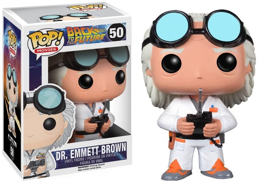 Figura de vinilo Funko Pop de Dr. Emmett Brown con gafas y control remoto junto a su caja.