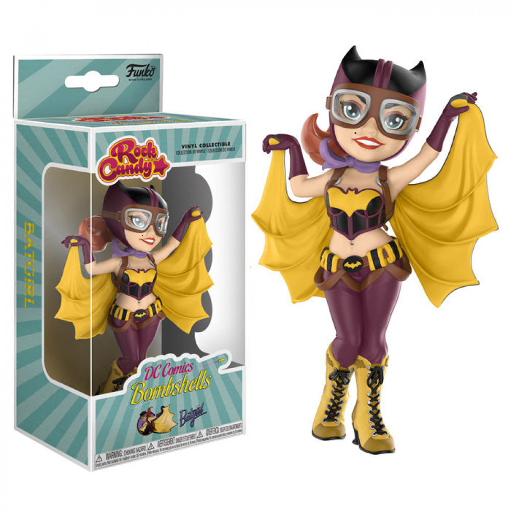 Eine DC Comics Bombshells Batgirl Vinyl-Figur steht neben ihrer Box.