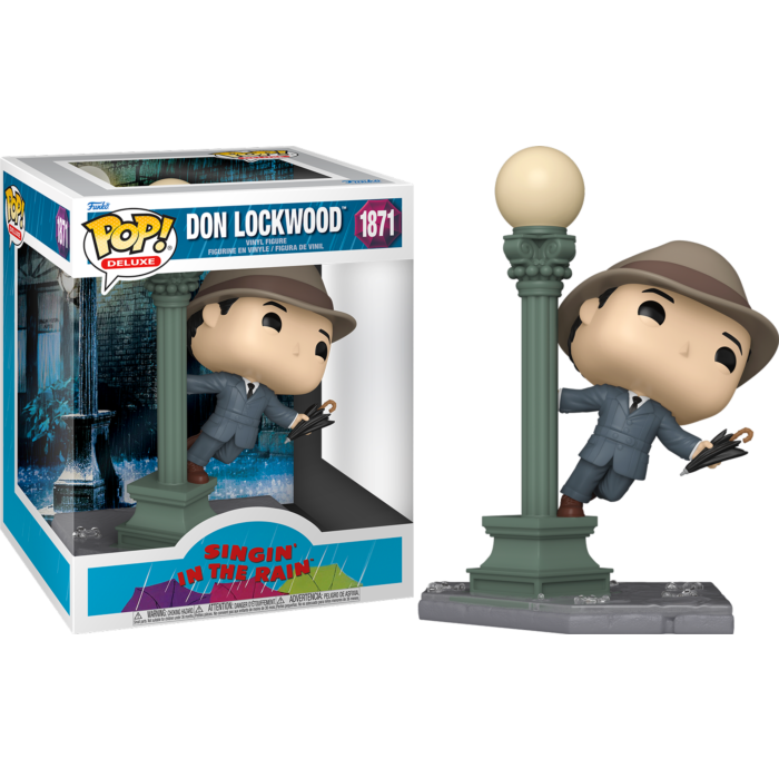 Una figura Pop! de Don Lockwood baila junto a una farola con un paraguas al lado de su caja.
