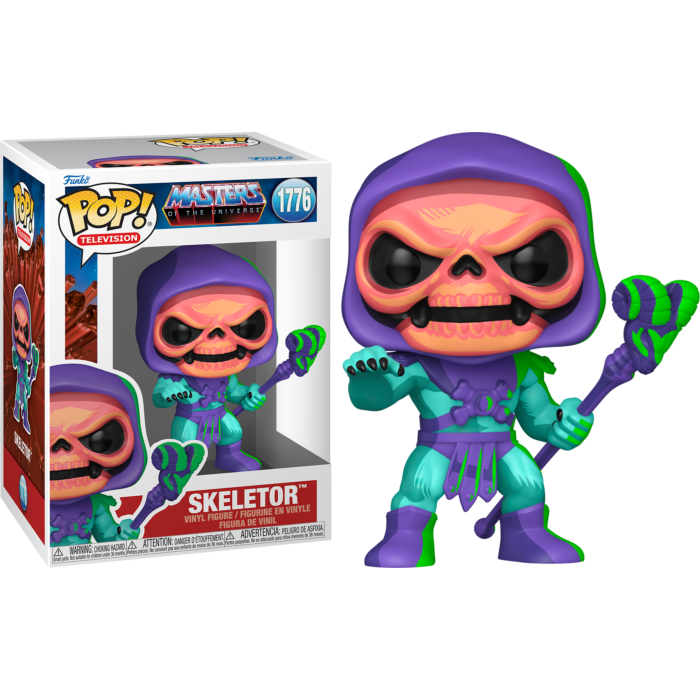 Figura Funko Pop de Skeletor con capucha morada y bastón verde junto a su caja.