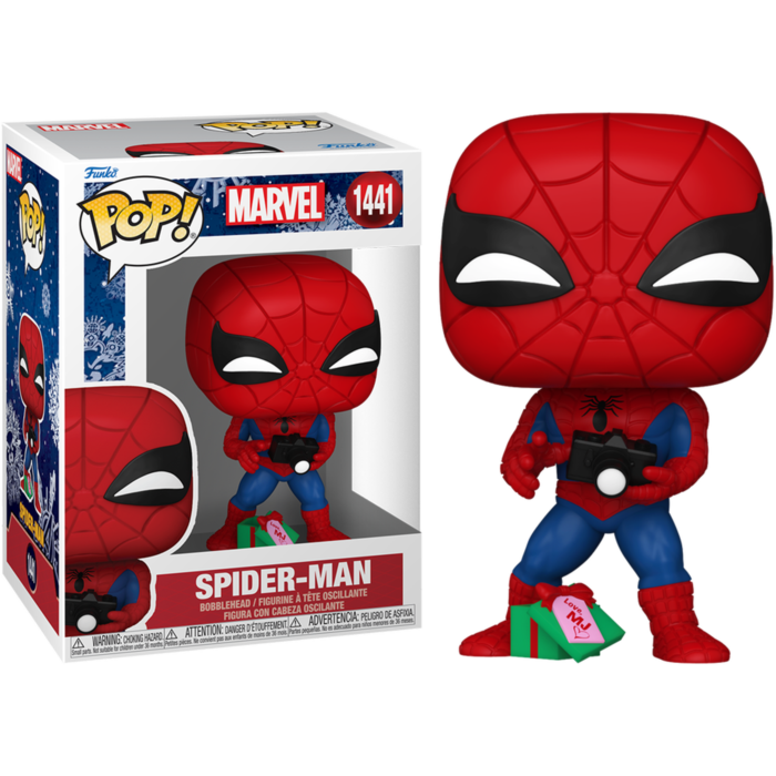 Figura Funko Pop de Spider-Man con cámara y caja de regalo, junto a su caja.