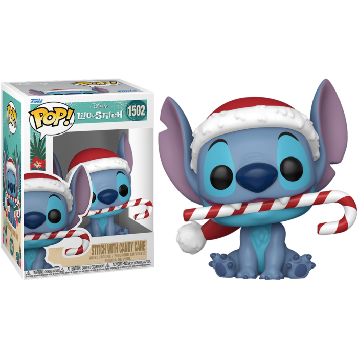 Figurka Funko Pop Stitch w czapce Mikołaja trzymająca laskę cukrową w ustach, obok pudełka.