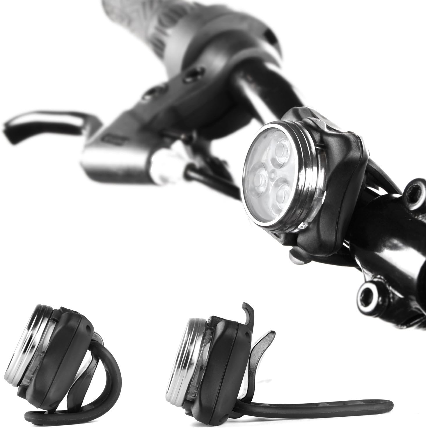 Fahrradlenker mit Frontlicht und zwei separate Fahrradlichter mit Gummiband unten.